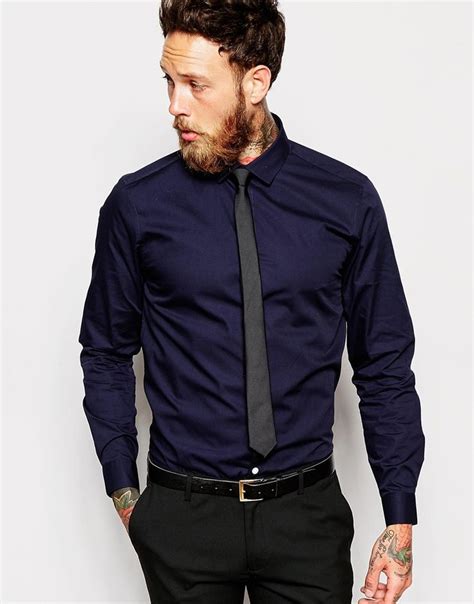 navy blue shirt with tie.